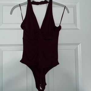 Ruby and Jenna boutique (brand: Olivacious) halter plum/ maroon bodysuit)